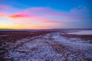 Sunset over salt flats with colorful sky at Manick Bhan location.